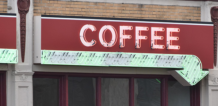 Neon diner sign says coffee 