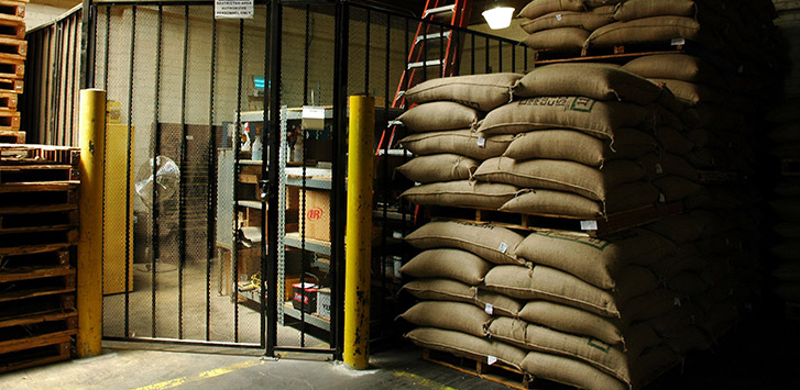 Stack of burlap bags in a warehouse