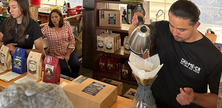 A man makes a pour over