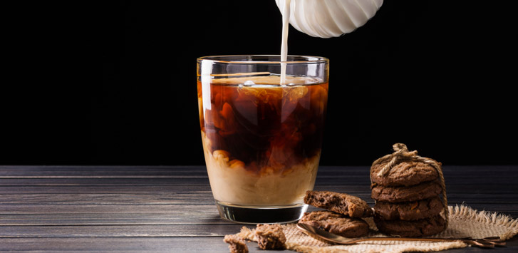 Pouring a decaf cold brew