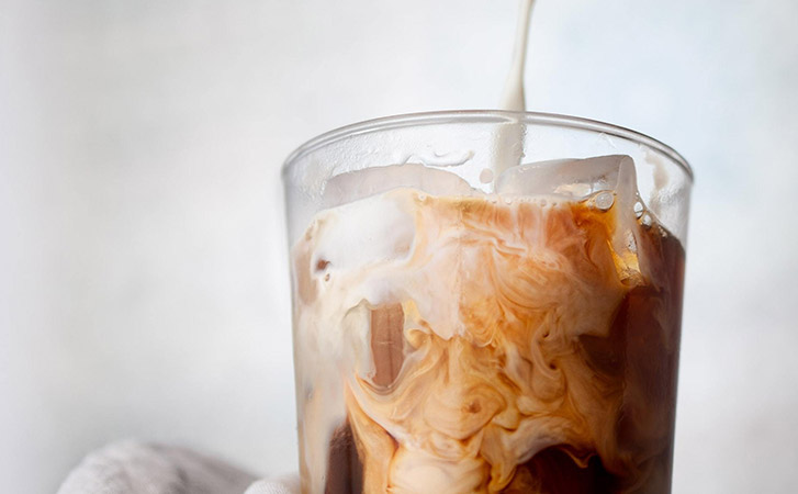Kahlua coffee with cream poured in
