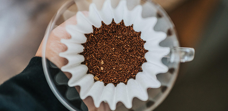 Coffee grounds in a paper filter