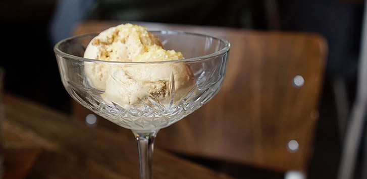 Coffee ice cream in a crystal stemmed glass