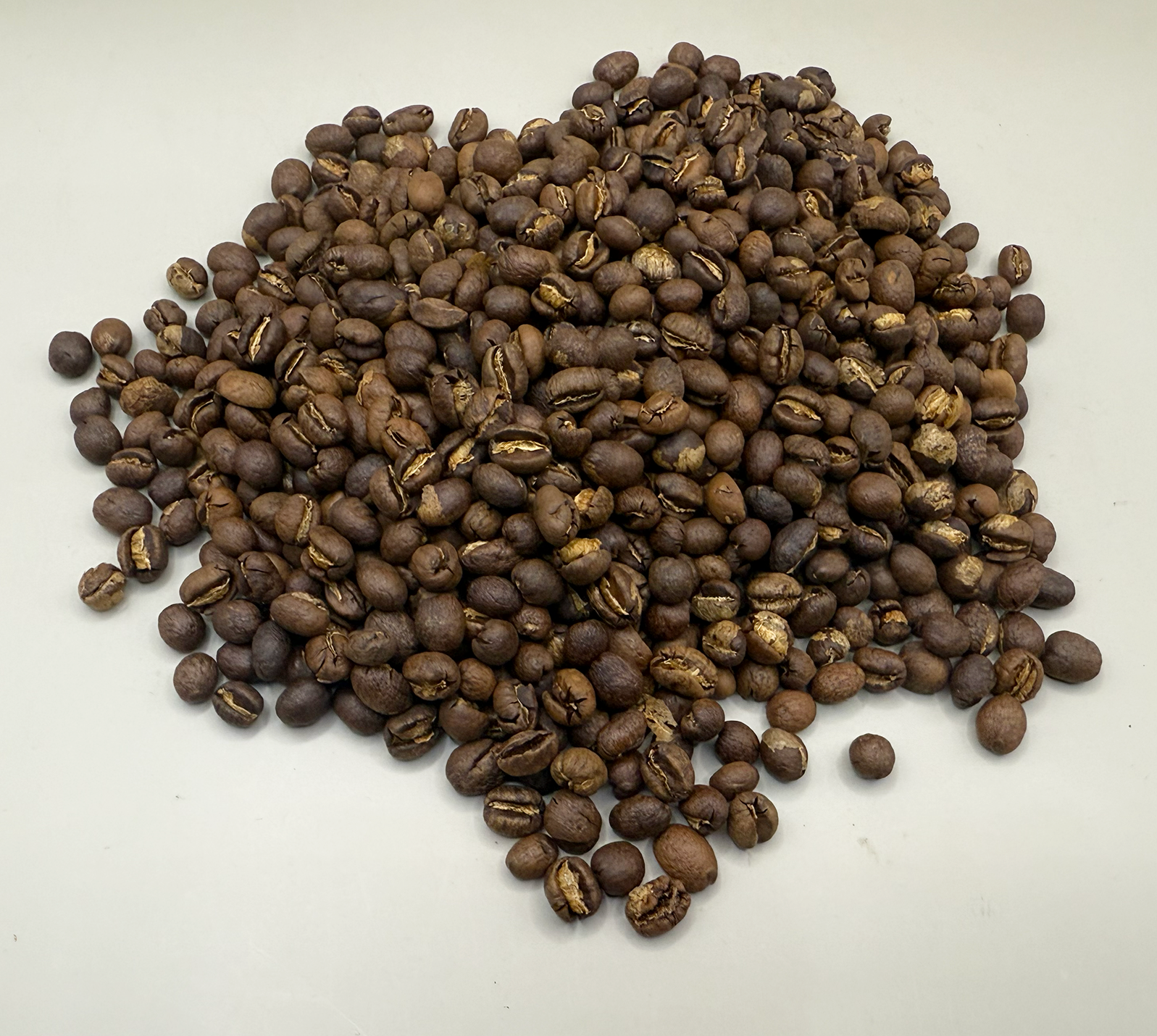 Vibrant and exotic, this Tanzania Peaberry offers a clean, juicy cup with tangy wine-like acidity.