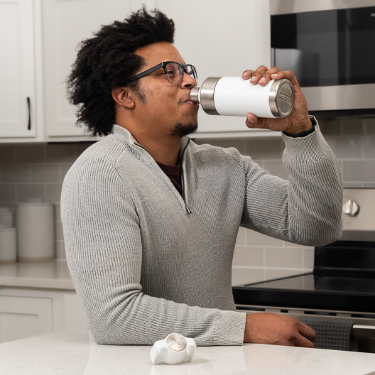 Man enjoying Toddy Go Brewer drink